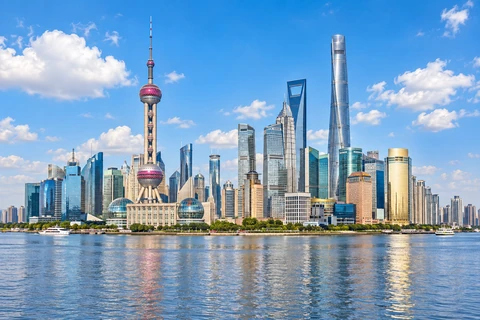 Shanghai skyline and the Oriental Pearl Tower across the river.